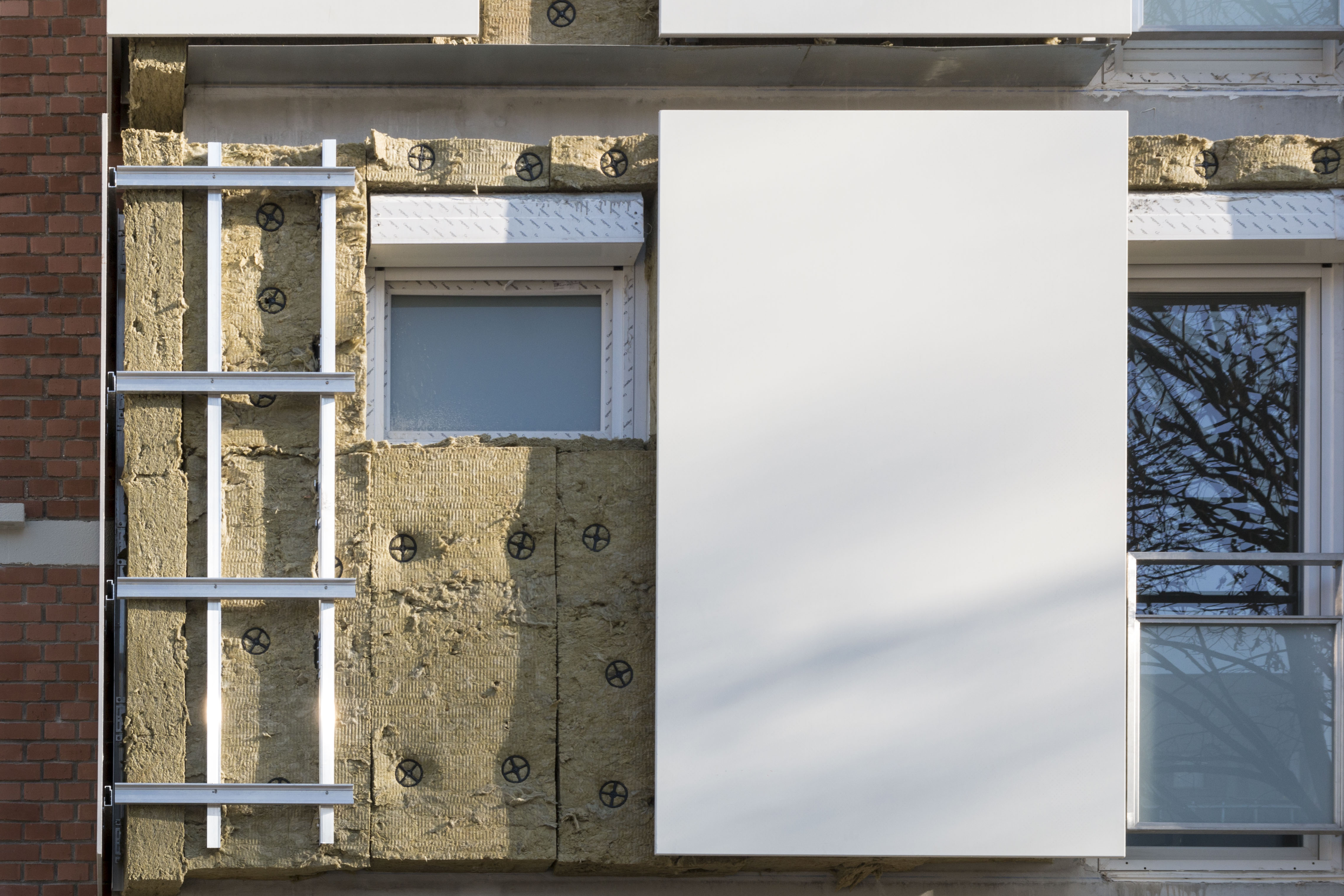 Gallery of Rainscreen Cladding Panels in Gentilly Renovation Project - 4
