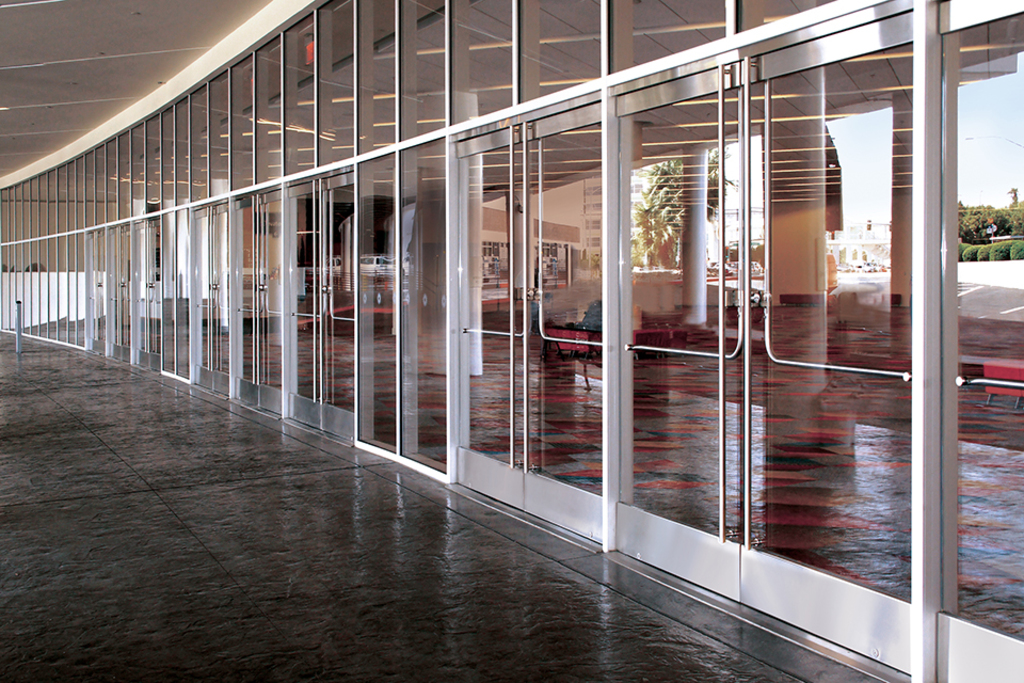 All Glass Entrances Featuring Drs Wedge Lock Door Rail System From C R Laurence