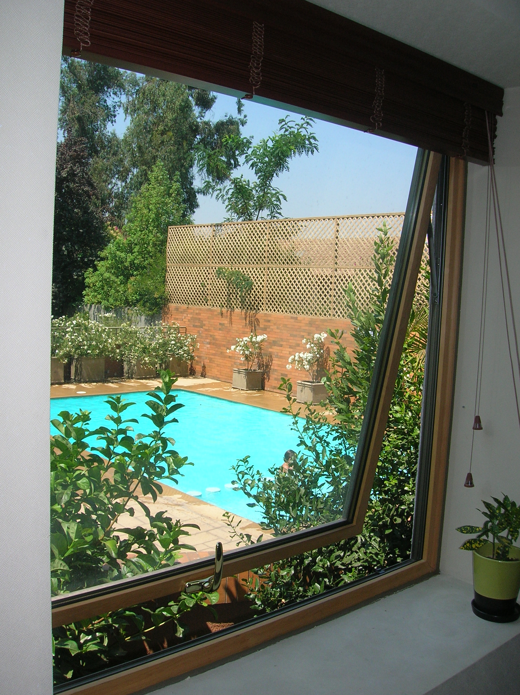 Ventanas y Puerta de doble contacto AluminioMadera Sistema Almalux de