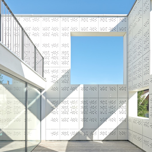 Fiber Cement Cladding Panels in Patio Building from Swisspearl