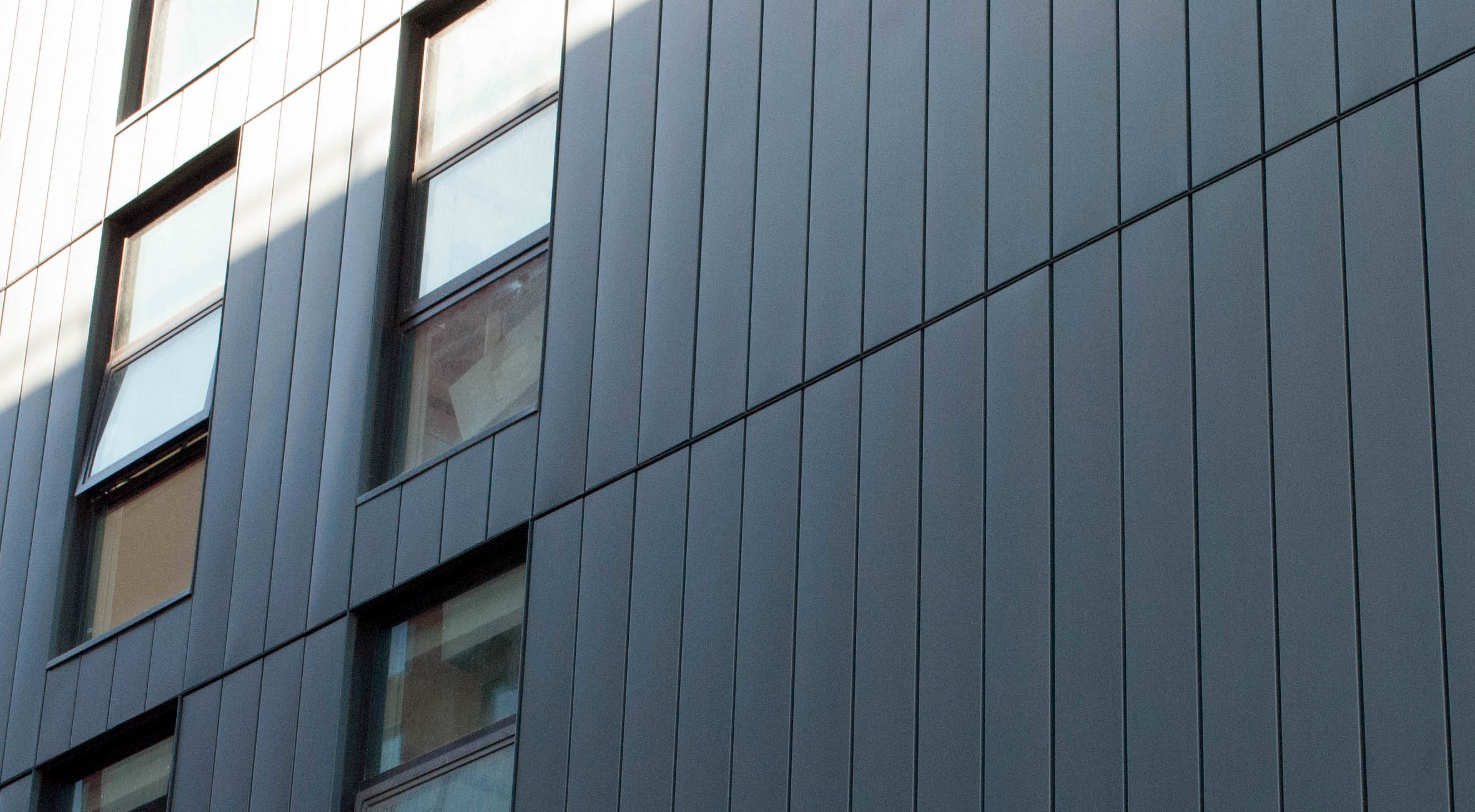 Gallery of Folded Zinc Panels in One Henry Adams 7