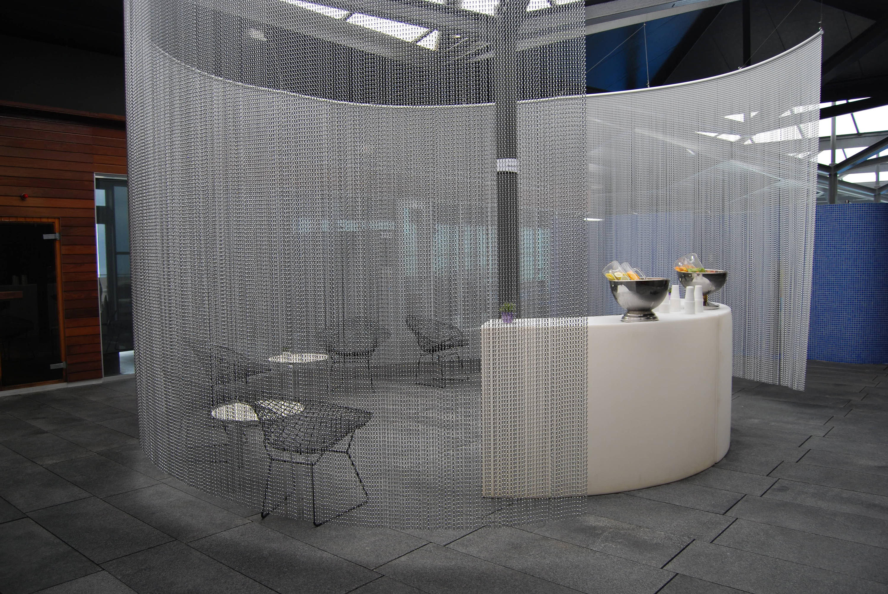 Gallery of Metal Fabric - Curved Space Dividers - 6