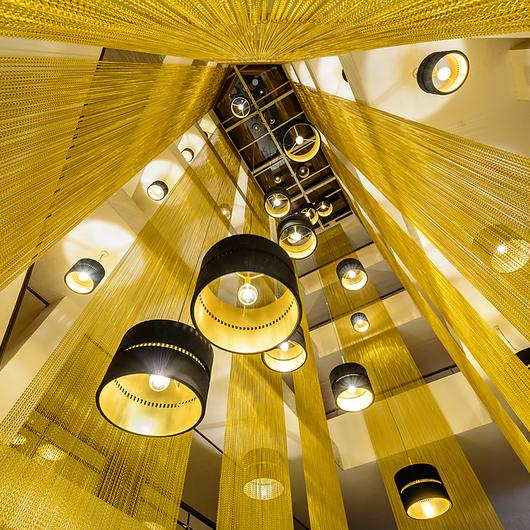 Metal Chain Sculptural Lighting in Ibiza Hotel / Kriskadecor