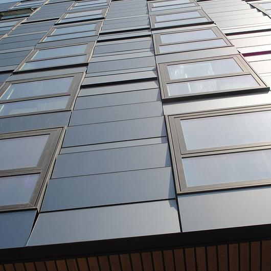 Gallery of Custom Solar Facades - Shingles - 5