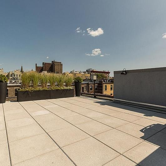 Gallery of Skybox Skylights in Harlem City Home Rooftops 3