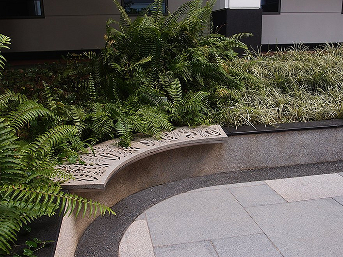 Street furniture made of customized natural stone grilles