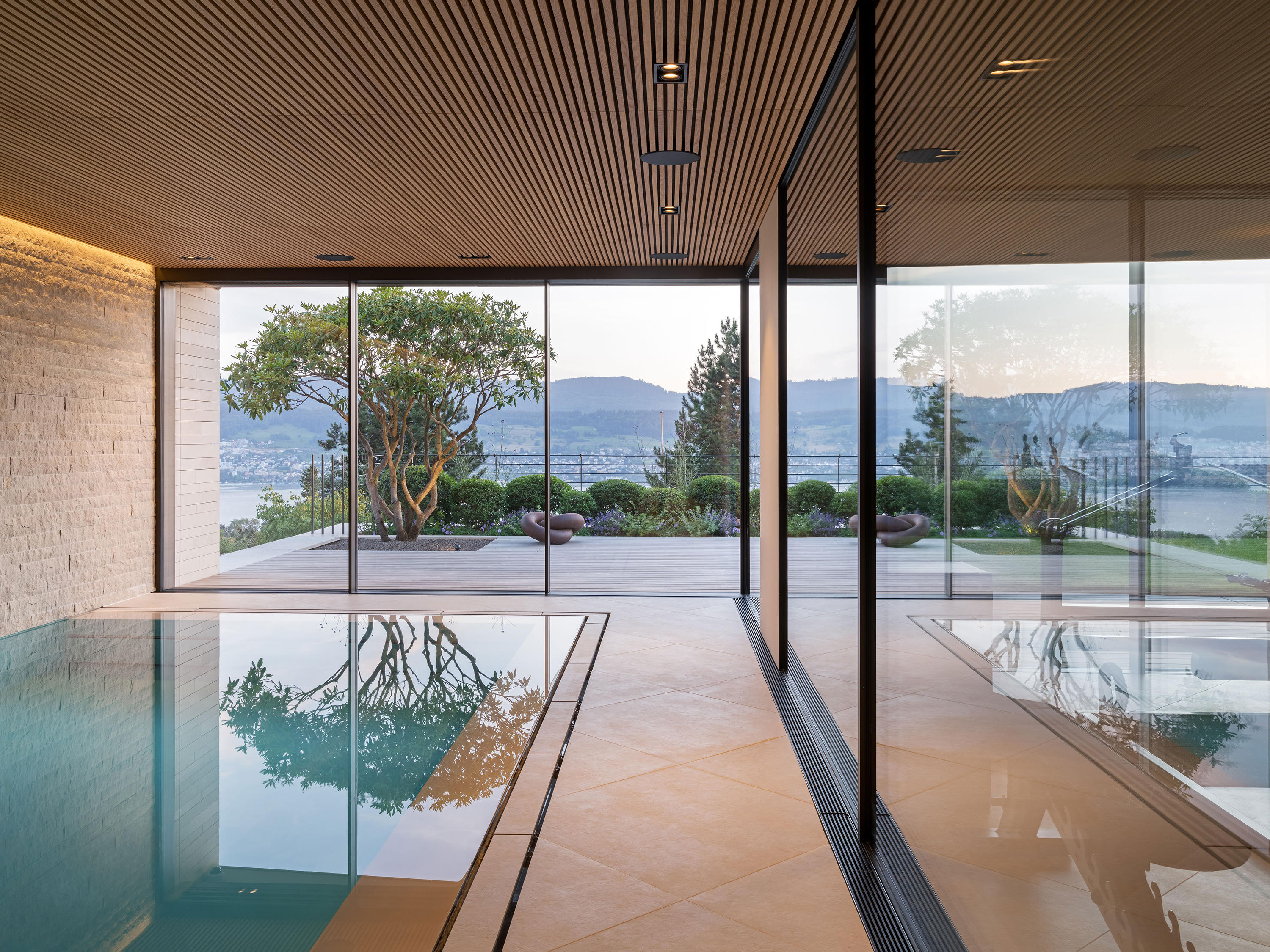 Splash Less Round Window Gallery of Minimalist Frameless Sliding Windows - 2