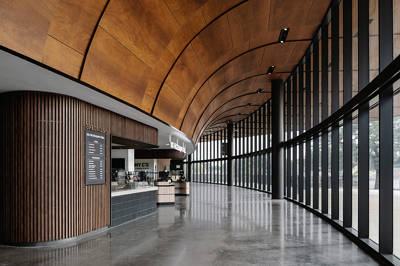 Curved Wooden Soffit in the UT Moody Center Arena