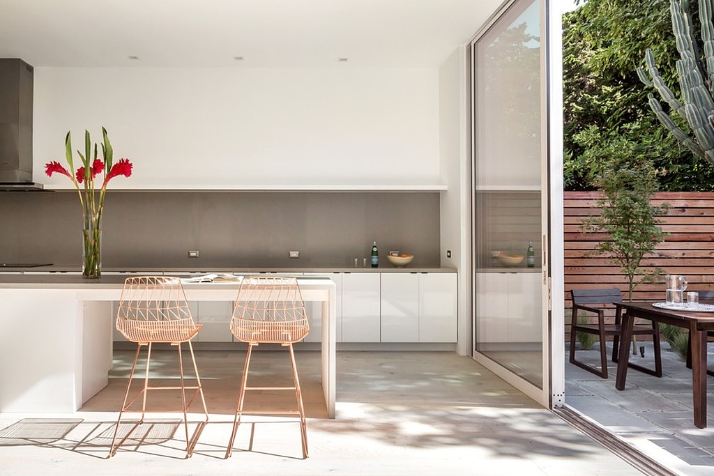 Gallery of Interior Cladding in Kitchen Projects - 14