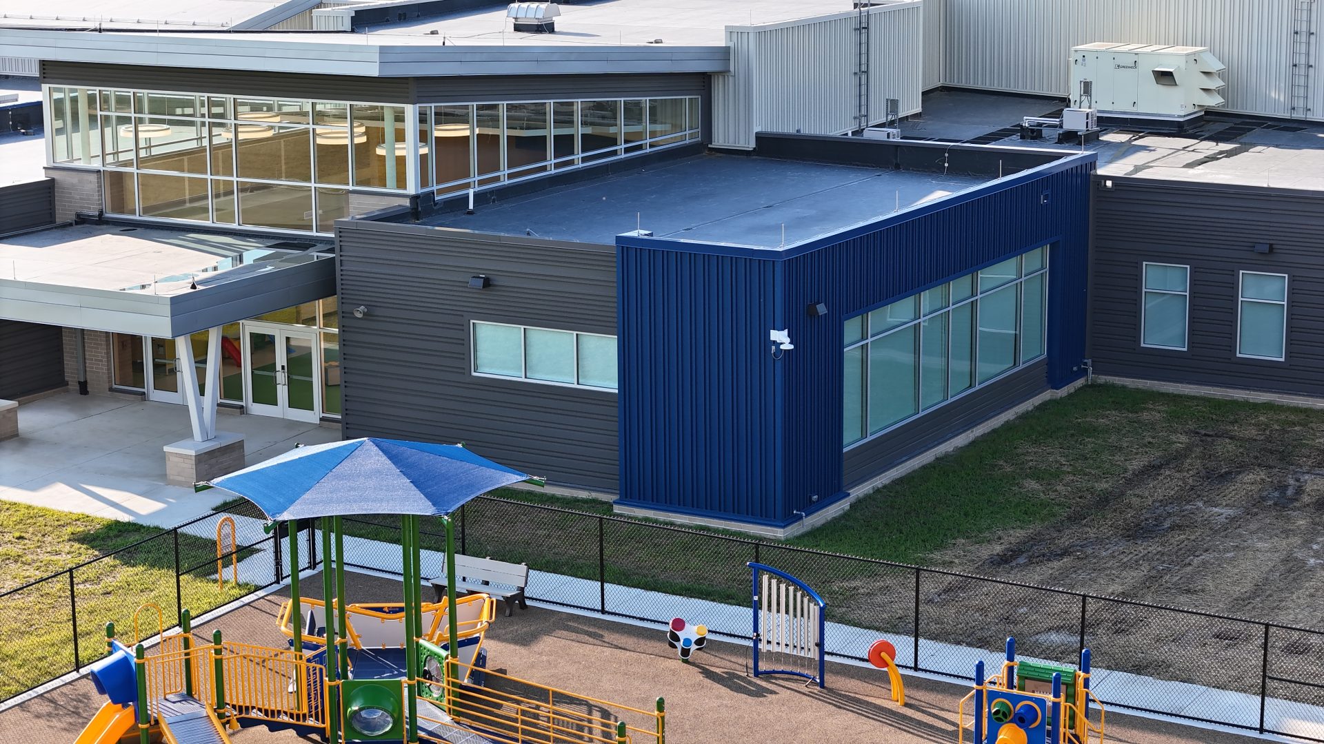 gallery-of-metalic-wall-panels-at-howard-t-ennis-school-2