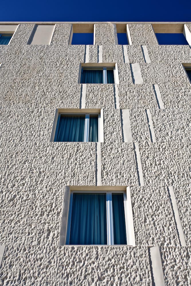 A closer look at Grand Flame Limestone Cladding For Luxury Penthouses