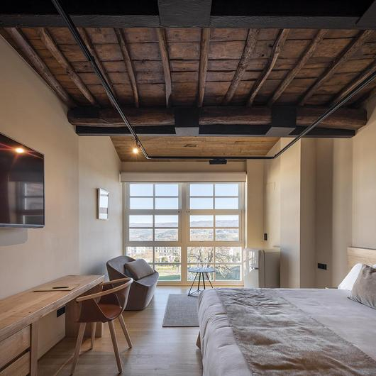 Chestnut Timber in Hotel Restoration at Celanova / Siero Lam