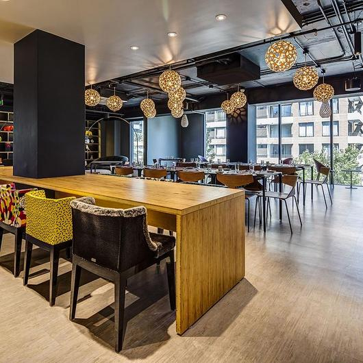 Revestimientos Ripados en Nodo Hotel / Masisa®