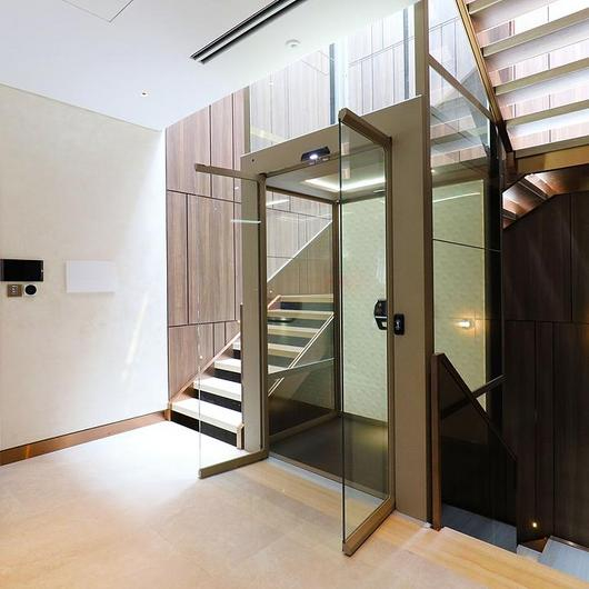 Scandinavian Glass Elevator in a Saigon Villa / Cibes Lift Asia