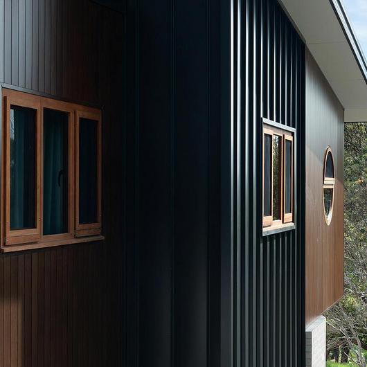 Interlocking Boards for Cladding / KNOTWOOD