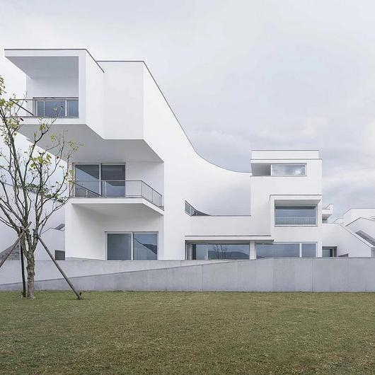 Facade Insulation at Dongqian Lake Club Houses / Sto