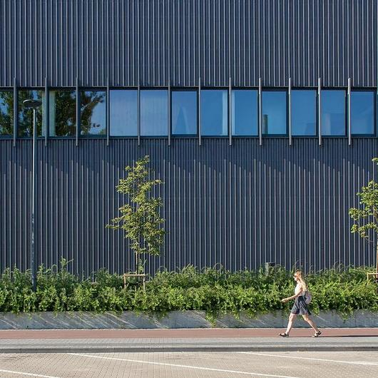 Lunawood ThermoWood® Façade in Ogmios City / Lunawood