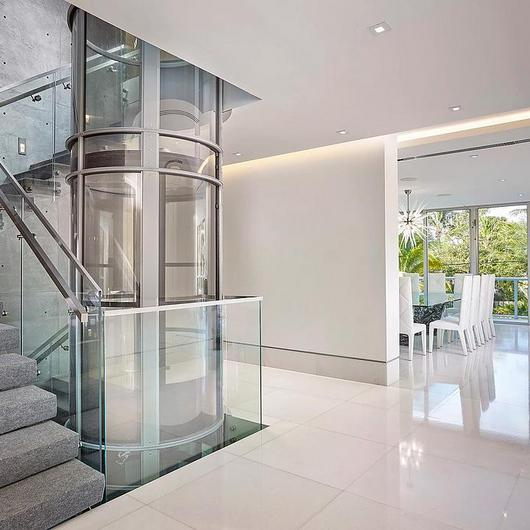 Round Glass Elevators / Siller Treppen 