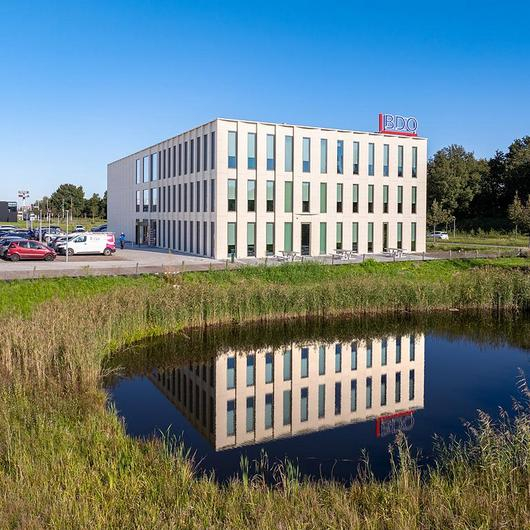 Paper-Textured Panel Façade for BDO Offices / ULMA Architectural Solutions